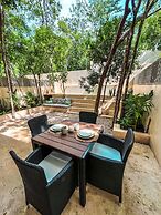 Oasis en la selva con piscina priva