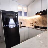 Modern And Comfortable Living At 2Br Grand Sungkono Lagoon Apartment