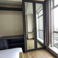 Modern And Comfortable Living At 2Br Grand Sungkono Lagoon Apartment