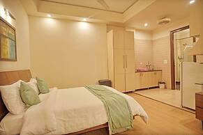Enkay Suites - DLF CyberCity