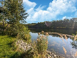 Serene Lakeside Manor by Belvilla