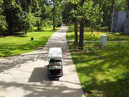 Serene Lakeside Manor by Belvilla