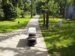 Lake House in Forest by Belvilla