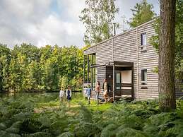 Lakehouse With Forest Views by Belvilla