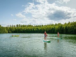 Lakehouse With Forest Views by Belvilla