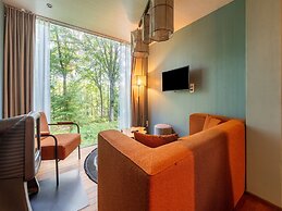 Tranquil Forest Getaway by Belvilla