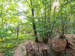 Tranquil Forest Getaway by Belvilla