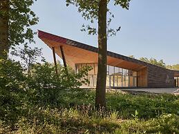 Tranquil Forest Getaway by Belvilla