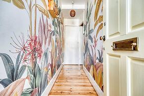 Stylish 2BD with Private Garden & Sauna