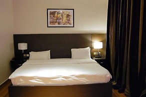 Continental Hotel by R&K Suites