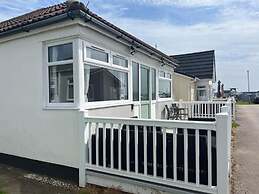 Seasideescape-2br-sleeps4-parking-petsok-fireplace