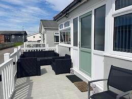 Seasideescape-2br-sleeps4-parking-petsok-fireplace