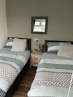 Seasideescape-2br-sleeps4-parking-petsok-fireplace