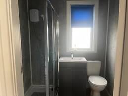 Seasideescape-2br-sleeps4-parking-petsok-fireplace