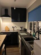 Seasideescape-2br-sleeps4-parking-petsok-fireplace