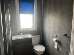 Seasideescape-2br-sleeps4-parking-petsok-fireplace