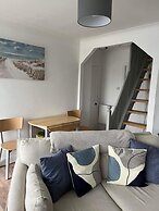 Seasideescape-2br-sleeps4-parking-petsok-fireplace