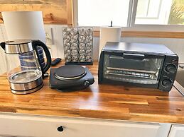 Enchanting Getaway: Farmhouse and Tiny House Duo