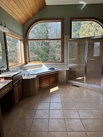 Hidden Waterfront Luxury Oasis With 9-acre Pond 5 Bedroom Home by RedA