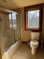 Hidden Waterfront Luxury Oasis With 9-acre Pond 5 Bedroom Home by RedA