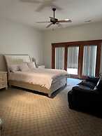 Hidden Waterfront Luxury Oasis With 9-acre Pond 5 Bedroom Home by RedA