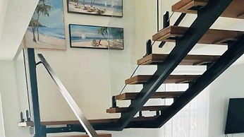 Kick Back and Relax in This Calm, Stylish Space