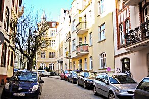 Red by Grand Apartments