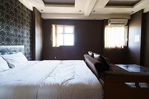 OYO 94238 The Suite Metro Apartment By Riz Living