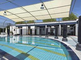 Bungalow in Caorle With Garden Furniture