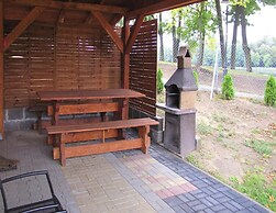 Cottage With Fireplace, Right on the Lake, Ryn