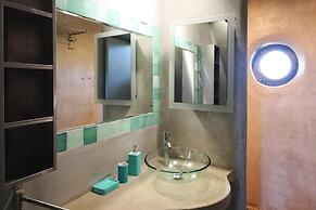 Quaint Stone House Between Land and sea