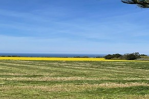 Quaint Stone House Between Land and sea