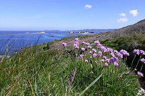 Quaint Stone House Between Land and sea