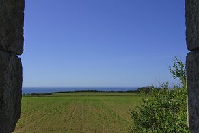 Quaint Stone House Between Land and sea
