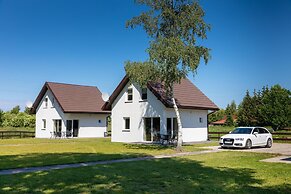 Brick House in Ledzin Near Dutch Windmill