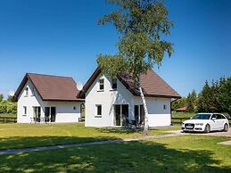Brick House in Ledzin Near Dutch Windmill