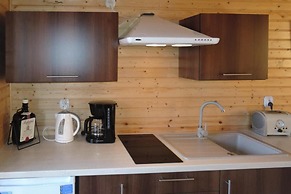 Modern Wood House in Rewal With a Terrace