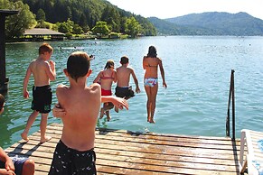 Sunny Holiday Apartment on Lake Klopeiner With Balcony and Private Bea