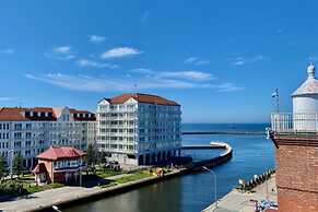 Holiday Apartment Right Next to the Beach Darlowko