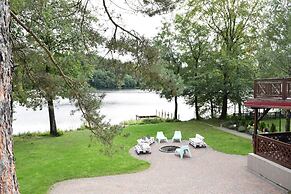 Holiday Home With hot tub and Sauna Directly at the Lake-ex TUI