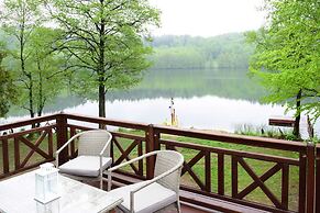 Holiday Home With hot tub and Sauna Directly at the Lake-ex TUI