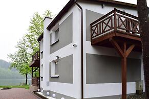 Holiday Home With hot tub and Sauna Directly at the Lake-ex TUI