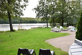 Holiday Home With hot tub and Sauna Directly at the Lake-ex TUI