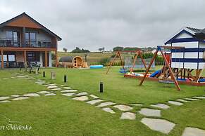 Holiday Resort With Sauna and Jacuzzi, Mielenko