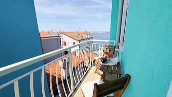 Bagatella Apartaments - Attico Laguna e Mare