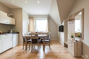 Apartment in Leba With a Garden