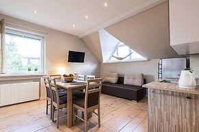 Apartment in Leba With a Garden