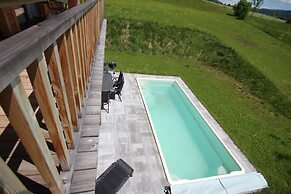 Chalet Max View mit Pool und Sauna
