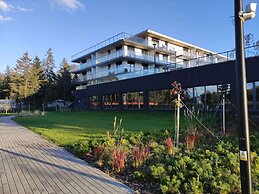 A Comfortable Apartment With a Swimming Pool and Sauna in Dziwnow for 