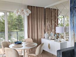 A Comfortable Apartment With a Swimming Pool and Sauna in Dziwnow for 